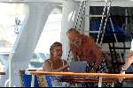 Porto Ercole 20 juli 2003
Prinses laurentien achter de laptop samen met Prins Bernhard op Jumbo VI