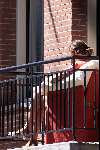 Amsterdam 11 mei 2001
Prinses Marilene zonnend op haar balkon