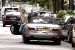 Amsterdam 30 juni 2004
Anita Schuts met jaguar cabrio op cornelis schuytstraat