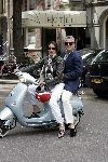 Amsterdam 27 juni 2004
Bram Moszkowicz met vrouw op scooter op pc hooftstraat