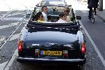 Amsterdam 18 juni 2005
Connie Breukhoven met Marvin Shanne en Edwin in Bentley Cabrio op de cornelis schuytstraat