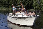 Nigtevecht 19 juni 2005
Jerry Schuiten met een interboat Intercruiser 34 op de vecht.