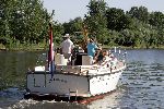 Nigtevecht 19 juni 2005
Jerry Schuiten met een interboat Intercruiser 34 op de vecht.