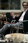 Amsterdam 16 juni 2005
Jan Lenferink met zijn hond ben op terras .
Hij heeft de papieren van zijn boek  