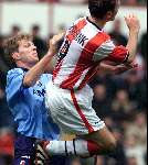 Eindhoven, 12 maart 2000
PSV-FC Utrecht, eindstand 2-1
Arnold Bruggink in duel met Alfons Groenedijk