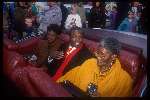 Regilio tuur tijdens een rondtocht door Rotterdam met links van hem z\'n moeder en rechts z\'n Oma
12 december 1992