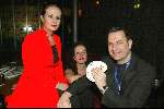 Amsterdam 3 maart 2004
Presentatie nieuw magazine Jacky in Jimmy Woo.
Ans Marcus met Siegried Marcus en een goochelaar