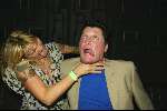 Amsterdam 3 maart 2004
Presentatie nieuw magazine Jacky in Jimmy Woo.
Barry Hay met vrouw met tatoeage