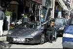 Amsterdam 27 maart 2004
Winston Bogarde met Lambourgini op PC Hooftstraat