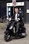 Amsterdam 24 maart 2005
Bram Moszkowicz op nieuwe Vespa scooter.