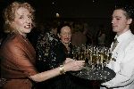 Amsterdam 12 maart 2005
Modeshow Mart Visser in het hilton.  
 Gerrie v d Klei met champagne