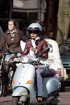 Amsterdam 24 maart 2005
Josefine v Asdonk op  Vespa scooter met gsm