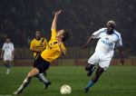 Breda, 28 Februari 2007
NAC-PSV, eindstand 3-0 Wedstrijd KNVB-beker 1/4 finale Seizoen 2006/2007
Arouna kone in duel met stervende zwaan Patrick Zwaanswijk