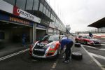 Zandvoort, 16 Maart 2007
Het verwisselen van banden van een porsch
Autoracerij