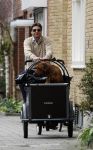 Amsterdam 17 maart 2007
Edwin de Roy v Zuydewijn op bakfiets met daarin zijn hond.