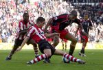 Eindhoven, 18 Maart 2007 Kompetitiewedstrijd PSV-AJAX, eindstand 1-5 Seizoen 2006/2007
Ibrahim Afellay in duel met Ryan Babel