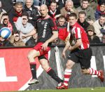 Eindhoven, 18 Maart 2007 Kompetitiewedstrijd PSV-AJAX, eindstand 1-5 Seizoen 2006/2007
Jaap Stam in duel met Jason Culina