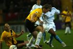 Breda, 28 Februari 2007
NAC-PSV, eindstand 3-0 Wedstrijd KNVB-beker 1/4 finale Seizoen 2006/2007
Jefferson Farfan in duel met Patrick Zwaanswijk en de op de grond liggende Arne Slot