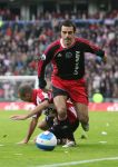 Eindhoven, 18 Maart 2007 Kompetitiewedstrijd PSV-AJAX, eindstand 1-5 Seizoen 2006/2007
Kenneth Perez omspeelt Diego Tardelli