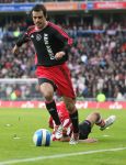 Eindhoven, 18 Maart 2007 Kompetitiewedstrijd PSV-AJAX, eindstand 1-5 Seizoen 2006/2007
Kenneth Perez omspeelt Diego Tardelli