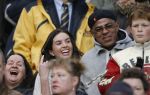 Eindhoven, 18 Maart 2007
Bij de wedstrijd PSV-AJAX met een eindstand van 1-5 op de tribune de vriendin van Patrick Kluivert, Rosanna Lima met haar moeder  en de vader van Patrick, Kenneth Kluivert