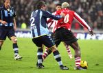 Eindhoven, 30 December 2006 Kompetitiewedstrijd PSV-FC Ado Den Haag, eindstand 2-1 Seizoen 2006/2007
Stijn Vreven in duel met Arouna Kone
Foto: Ronald Otter