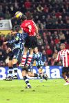 Eindhoven, 30 December 2006 Kompetitiewedstrijd PSV-FC Ado Den Haag, eindstand 2-1 Seizoen 2006/2007
Stijn Vreven in duel met Phillip Cocu
Foto: Ronald Otter