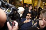 Schiphol 17 maart 2013
Badr Hari en Estelle Cruijff komen terug van de K1 finale in Zagreb waar Badr zijn voet gebroken heeft . Badr wordt in een rolstoel naar zijn auto gebracht. Badr met zijn moeder
Peter Smulders bv