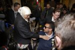 Schiphol 17 maart 2013
Badr Hari en Estelle Cruijff komen terug van de K1 finale in Zagreb waar Badr zijn voet gebroken heeft . Badr wordt in een rolstoel naar zijn auto gebracht. Badr met zijn moeder
Peter Smulders bv