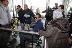 Schiphol 17 maart 2013
Badr Hari en Estelle Cruijff  komen terug van de K1 finale in Zagreb waar Badr zijn voet gebroken heeft . Badr wordt in een rolstoel naar zijn auto gebracht.
Peter Smulders bv