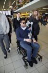Schiphol 17 maart 2013
Badr Hari en Estelle Cruijff  komen terug van de K1 finale in Zagreb waar Badr zijn voet gebroken heeft . Badr wordt in een rolstoel naar zijn auto gebracht.
Peter Smulders bv
