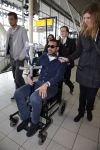 Schiphol 17 maart 2013
Badr Hari en Estelle Cruijff  komen terug van de K1 finale in Zagreb waar Badr zijn voet gebroken heeft . Badr wordt in een rolstoel naar zijn auto gebracht.
Peter Smulders bv