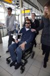 Schiphol 17 maart 2013
Badr Hari en Estelle Cruijff  komen terug van de K1 finale in Zagreb waar Badr zijn voet gebroken heeft . Badr wordt in een rolstoel naar zijn auto gebracht.
Peter Smulders bv