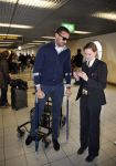 Schiphol 17 maart 2013
Badr Hari en Estelle Cruijff  komen terug van de K1 finale in Zagreb waar Badr zijn voet gebroken heeft . Badr wordt in een rolstoel naar zijn auto gebracht.
Peter Smulders bv