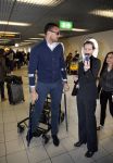 Schiphol 17 maart 2013
Badr Hari en Estelle Cruijff  komen terug van de K1 finale in Zagreb waar Badr zijn voet gebroken heeft . Badr wordt in een rolstoel naar zijn auto gebracht.
Peter Smulders bv