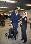 Schiphol 17 maart 2013
Badr Hari en Estelle Cruijff  komen terug van de K1 finale in Zagreb waar Badr zijn voet gebroken heeft . Badr wordt in een rolstoel naar zijn auto gebracht.
Peter Smulders bv