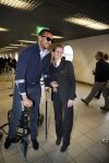 Schiphol 17 maart 2013
Badr Hari en Estelle Cruijff  komen terug van de K1 finale in Zagreb waar Badr zijn voet gebroken heeft . Badr wordt in een rolstoel naar zijn auto gebracht.
Peter Smulders bv