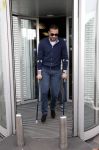 Schiphol 17 maart 2013
Badr Hari en Estelle Cruijff  komen terug van de K1 finale in Zagreb waar Badr zijn voet gebroken heeft . Badr wordt in een rolstoel naar zijn auto gebracht.
Peter Smulders bv