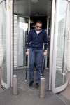 Schiphol 17 maart 2013
Badr Hari en Estelle Cruijff  komen terug van de K1 finale in Zagreb waar Badr zijn voet gebroken heeft . Badr wordt in een rolstoel naar zijn auto gebracht.
Peter Smulders bv