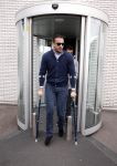 Schiphol 17 maart 2013
Badr Hari en Estelle Cruijff  komen terug van de K1 finale in Zagreb waar Badr zijn voet gebroken heeft . Badr wordt in een rolstoel naar zijn auto gebracht.
Peter Smulders bv