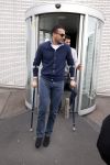 Schiphol 17 maart 2013
Badr Hari en Estelle Cruijff  komen terug van de K1 finale in Zagreb waar Badr zijn voet gebroken heeft . Badr wordt in een rolstoel naar zijn auto gebracht.
Peter Smulders bv