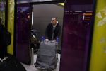 Schiphol 17 maart 2013
Badr Hari en Estelle Cruijff  komen terug van de K1 finale in Zagreb waar Badr zijn voet gebroken heeft . Badr wordt in een rolstoel naar zijn auto gebracht. zwager Badr
Peter Smulders bv