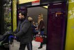 Schiphol 17 maart 2013
Badr Hari en Estelle Cruijff  komen terug van de K1 finale in Zagreb waar Badr zijn voet gebroken heeft . Badr wordt in een rolstoel naar zijn auto gebracht.
Peter Smulders bv
