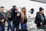 Schiphol 17 maart 2013
Badr Hari en Estelle Cruijff  komen terug van de K1 finale in Zagreb waar Badr zijn voet gebroken heeft . Badr wordt in een rolstoel naar zijn auto gebracht.
Peter Smulders bv