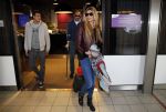 Schiphol 17 maart 2013
Badr Hari en Estelle Cruijff  komen terug van de K1 finale in Zagreb waar Badr zijn voet gebroken heeft . Badr wordt in een rolstoel naar zijn auto gebracht.
Peter Smulders bv