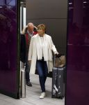 Schiphol 17 maart 2013
Badr Hari en Estelle Cruijff komen terug van de K1 finale in Zagreb waar Badr zijn voet gebroken heeft . Badr wordt in een rolstoel naar zijn auto gebracht. moeder Estelle en Evert Santegoeds
Peter Smulders bv