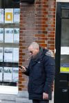 Amsterdam 17 februari 2015
Jeroen v Koningsbrugge met gsm / mobieltje op straat