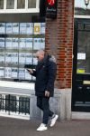 Amsterdam 17 februari 2015
Jeroen v Koningsbrugge met gsm / mobieltje op straat