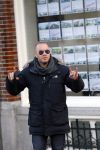 Amsterdam 17 februari 2015
Jeroen v Koningsbrugge met gsm / mobieltje op straat