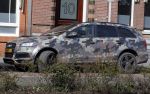 Amsterdam 9 maart 2016  
De auto van Gordon is gewrapt in legerkleur.